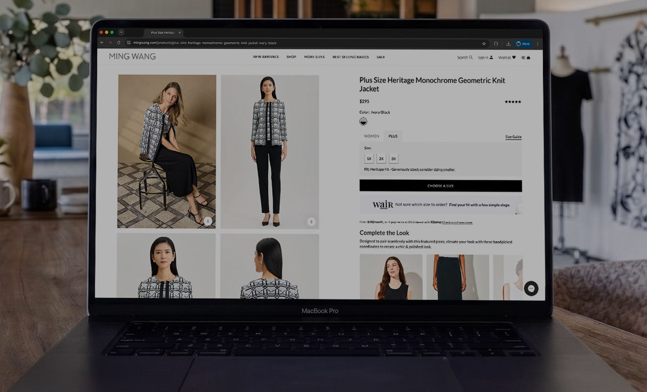 A brand product page open on a laptop — she shops the assortment